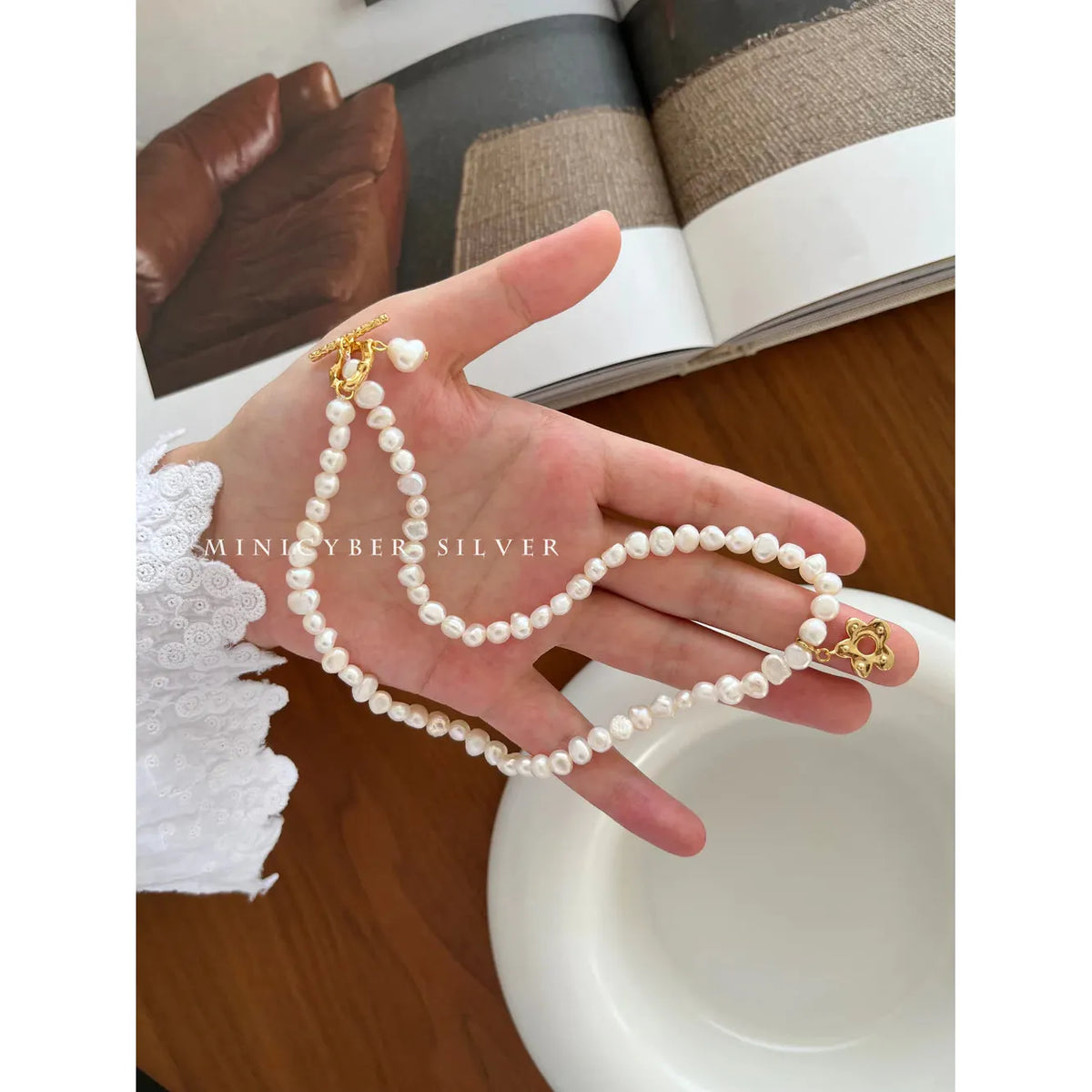 BAROQUE PEARL WITH FLOWER