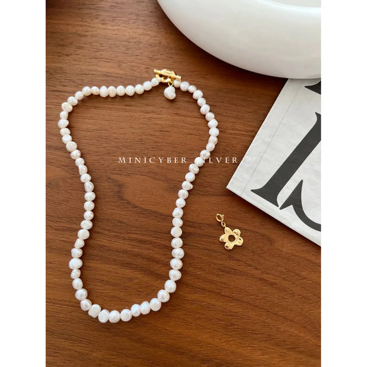 BAROQUE PEARL WITH FLOWER