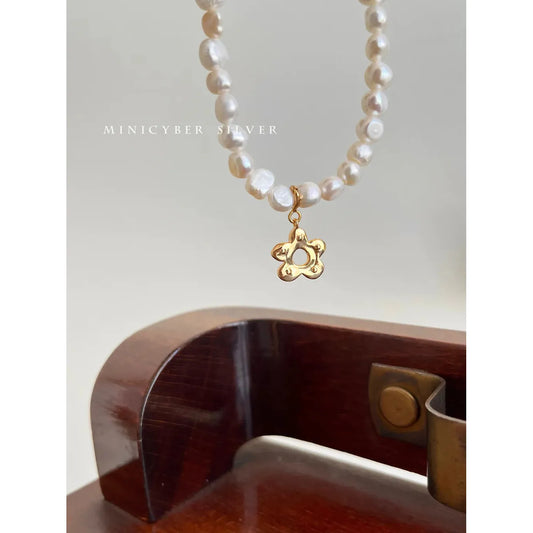 BAROQUE PEARL WITH FLOWER